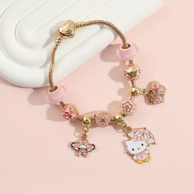 Pulsera Con Charms Hello Kitty Con Sombrilla Dorada - Sanrio